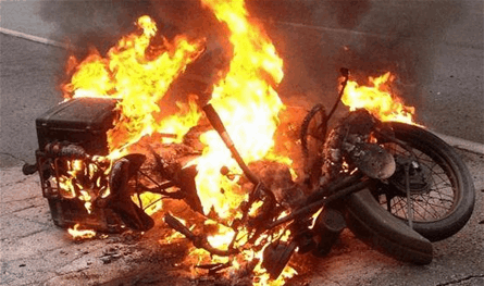 In Tripoli … pour gasoline on motorcycles and burn them