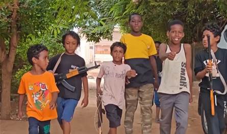 Children of Sudan in the war .. wooden guns and representative battles