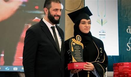 The first lady in Syria graduates from the university … and the President Sharia is delivered by the certificate