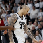 A violent clash ends a basketball match with 6 red cards shown