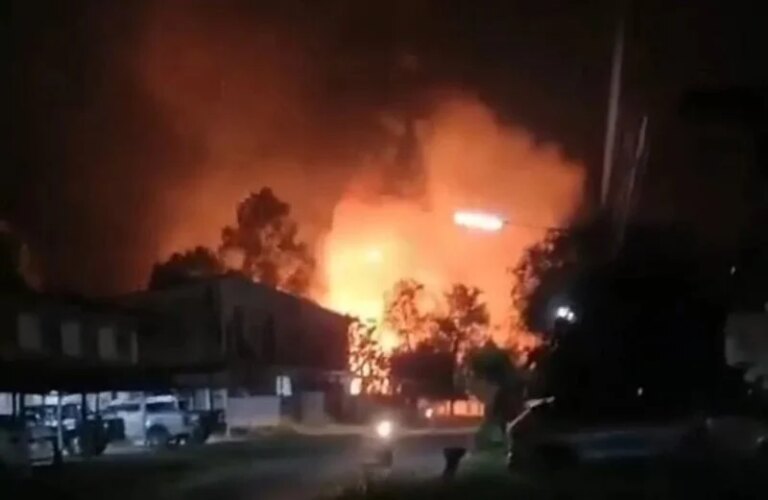 Fire and sounds of explosions shake an arms depot in Thailand