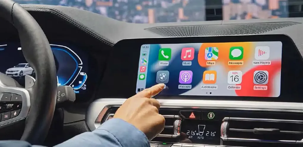 A new update to Apple CarPlay allows video playback while driving