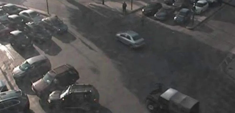 Bloody night: A barrage of bullets targets a store from a Chevrolet car.