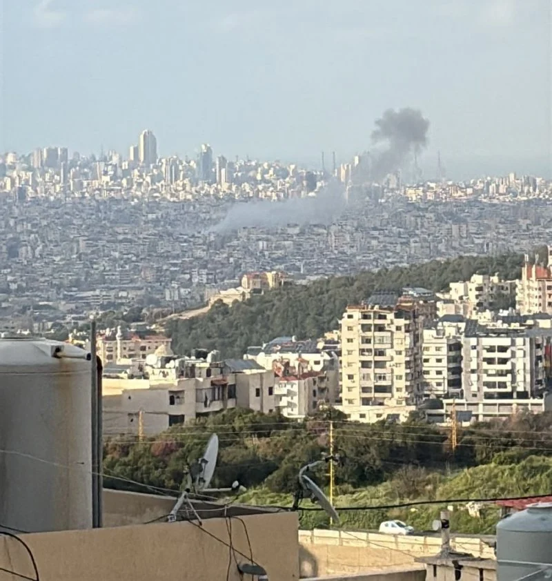 Israel threatens to escalate strikes, Hezbollah threatens to target infrastructure, and warns residents of the suburb