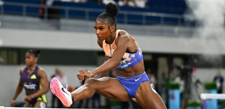 Olympic champion Russell defies her fears and approaches the world record