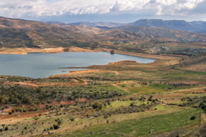 An emergency workshop to rehabilitate the road adjacent to the Qaraoun Dam and remove the remnants of the raids
