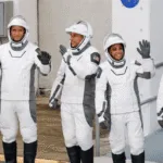 Four astronauts arrive at the International Space Station at record speed after a three-week delay