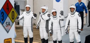 Four astronauts arrive at the International Space Station at record speed after a three-week delay
