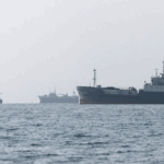 An international coalition of 60 countries rejects the Hormuz fees, amid urgent European moves to pressure Tehran