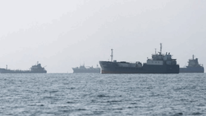 An international coalition of 60 countries rejects the Hormuz fees, amid urgent European moves to pressure Tehran