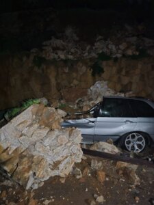Rocks collapsed and a car was destroyed due to heavy rains in Sir Al-Dinniyeh